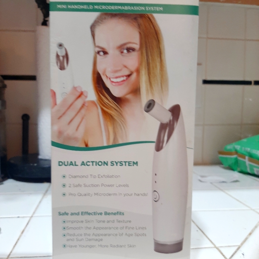 Dr. Phil's Mini handheld microdermabrasion sysyem
